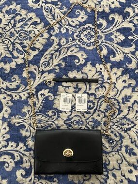 Coach WOC in gently used condition
